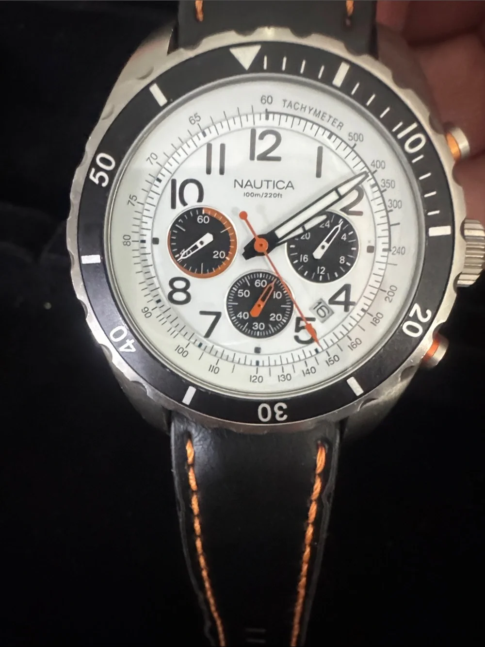 Nautica White Dial Chronograph Watch with Black Bezel and Orange Accents